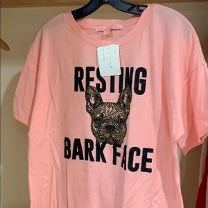 Pink Rebellious one dog shirt.